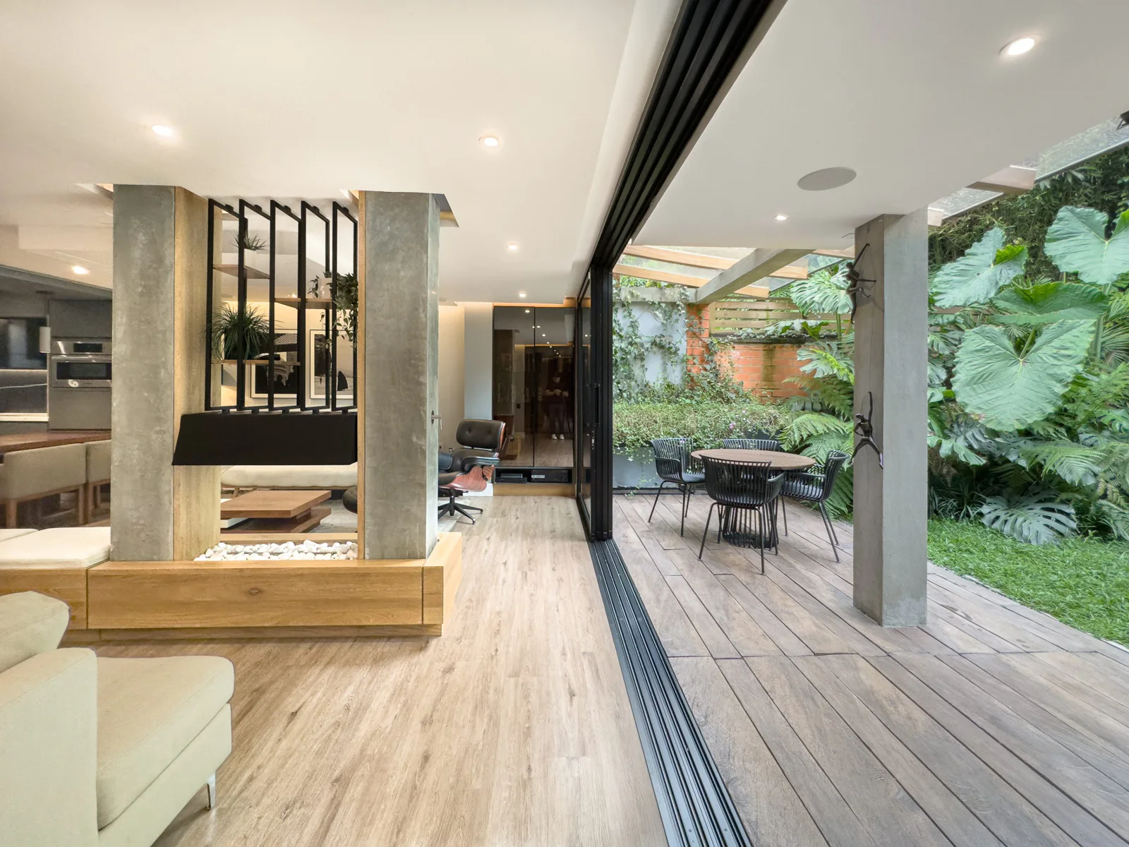 Casa Antigua – social area with sliding glass doors to the garden