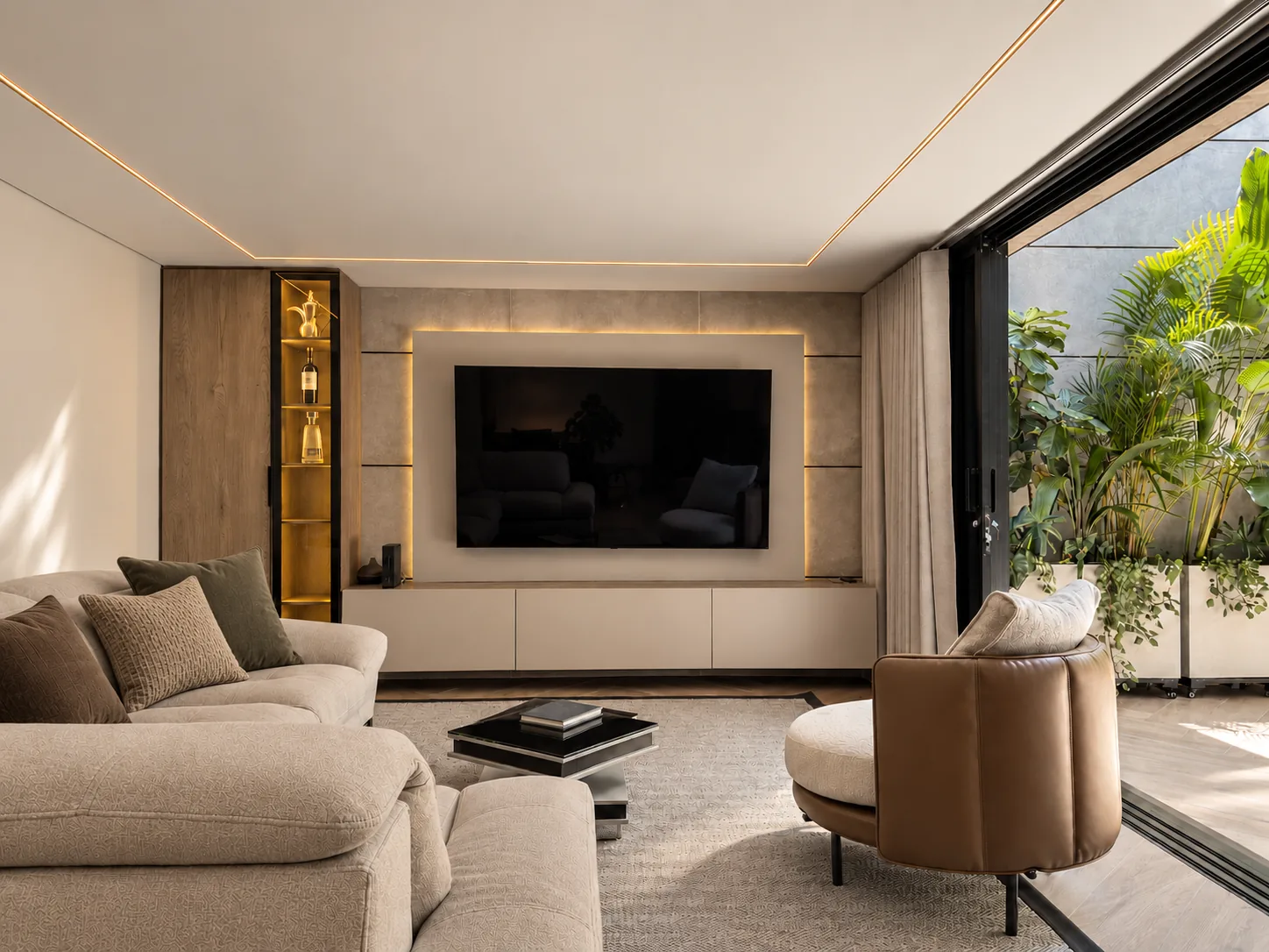 Casa Gascuña S&A – Living room with illuminated TV unit opening onto the courtyard