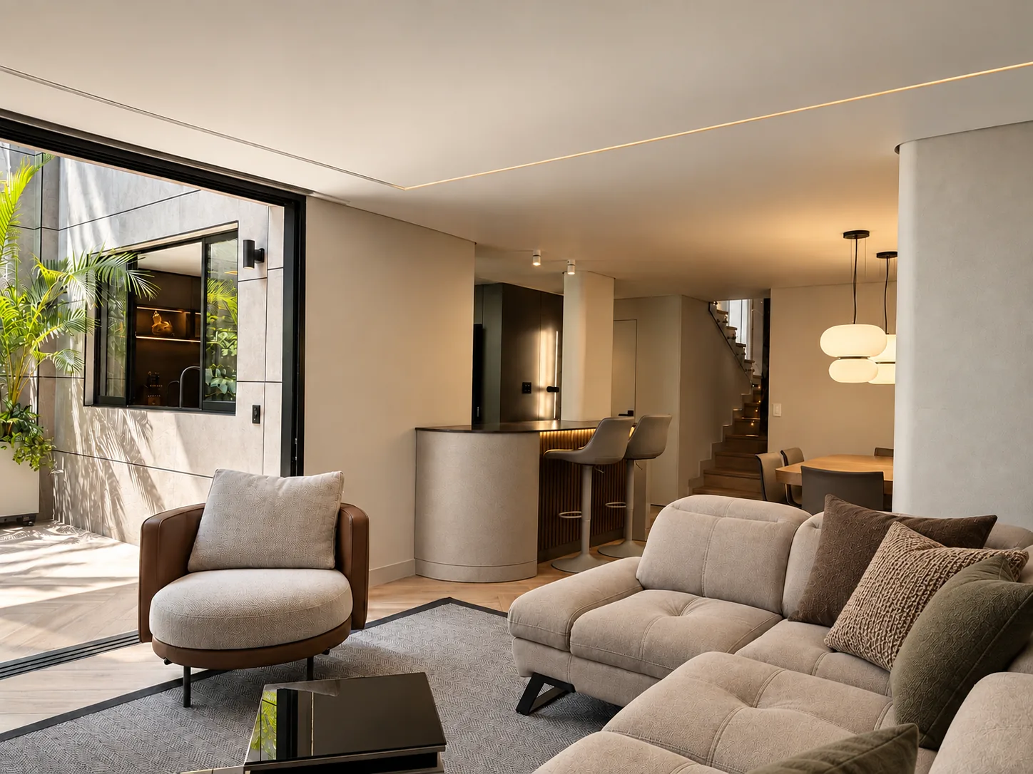 Casa Gascuña S&A – Overall view of the integrated living room, bar and dining room