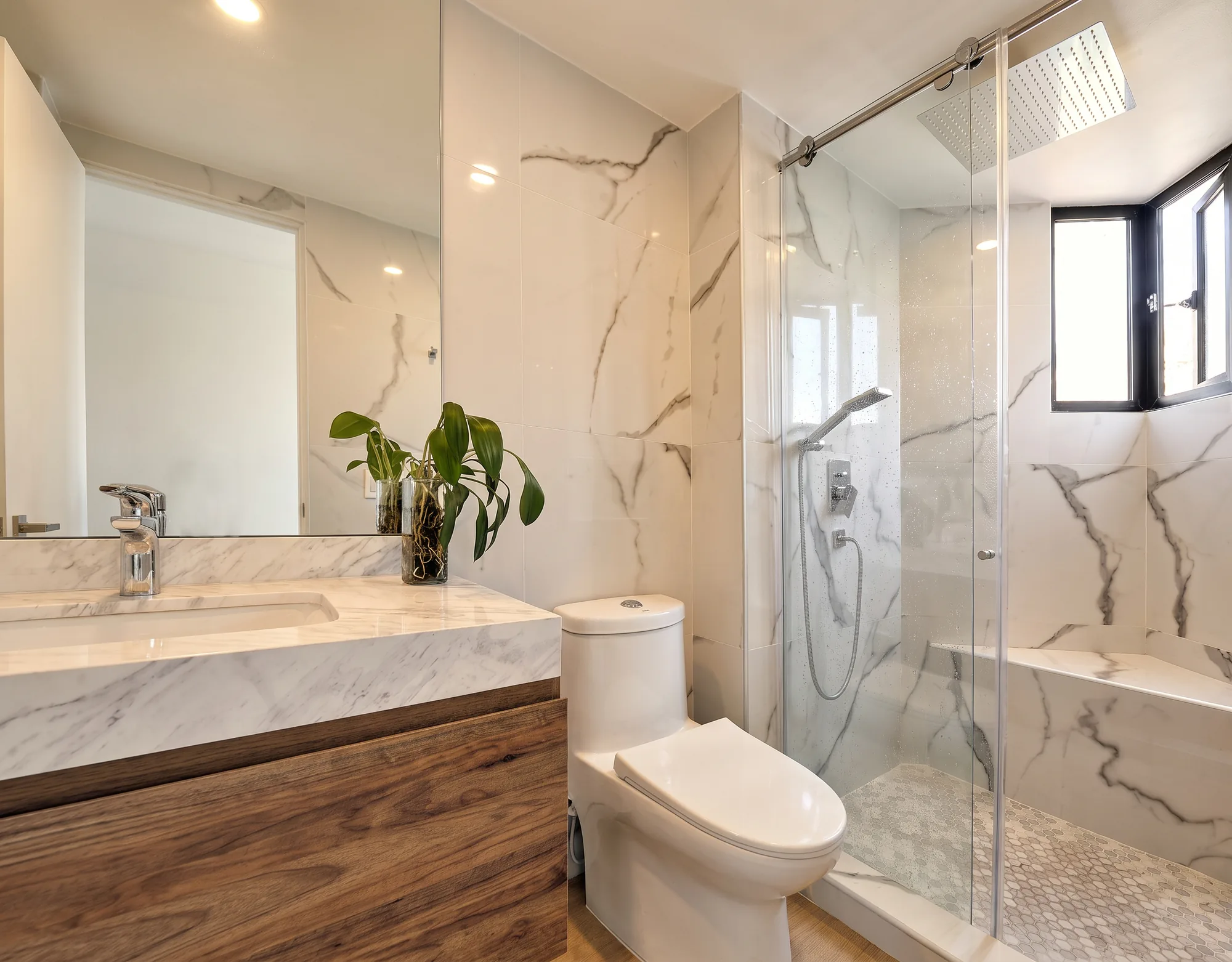 El Nogal Apartment – marble bathroom with glass shower