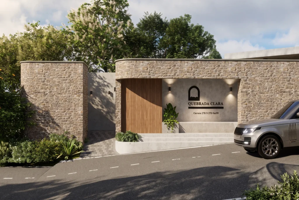 Quebrada Clara Gatehouse – stone wall with wooden door and sign