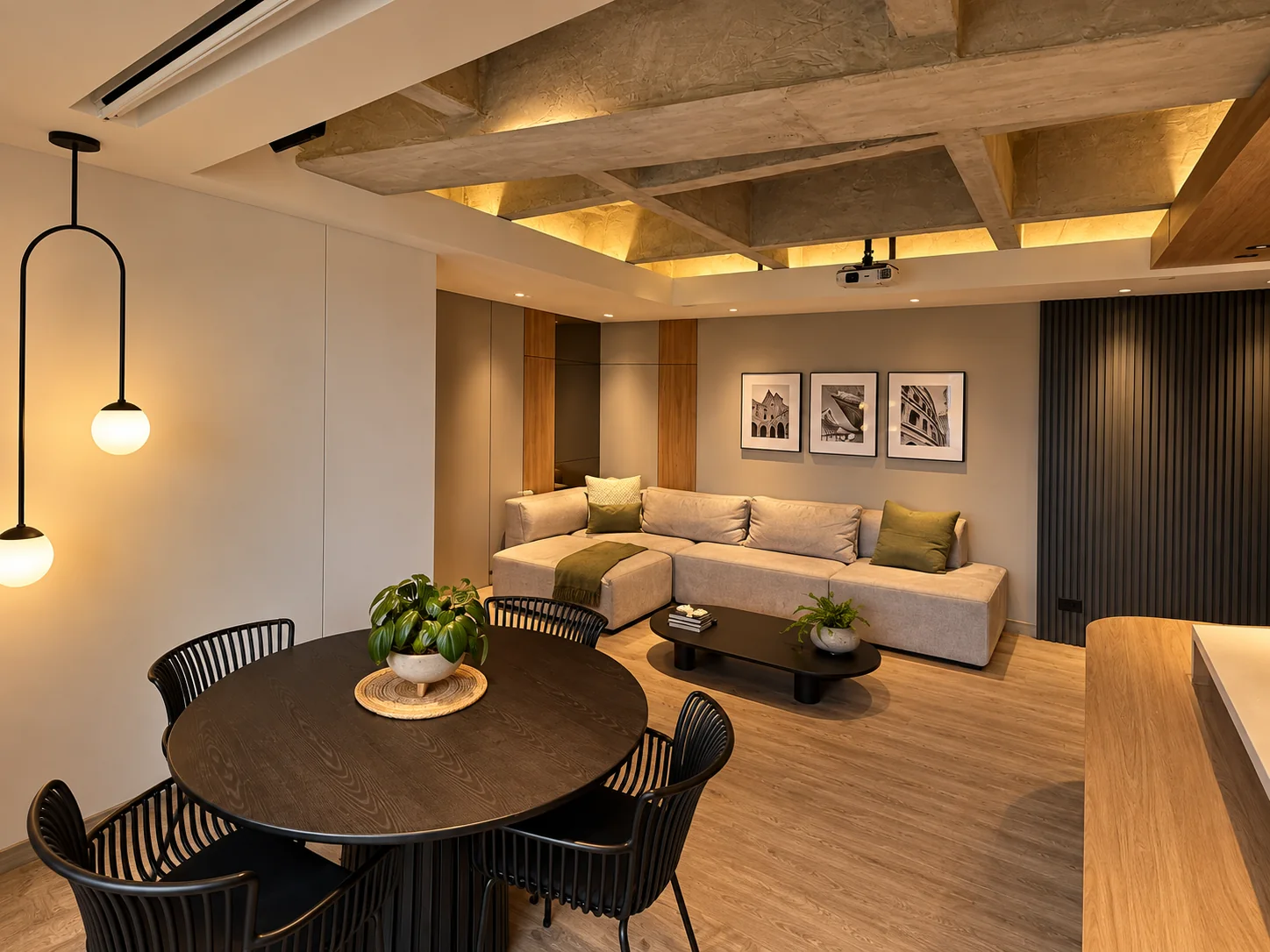 Rosset Apartment – round dining table and living room with black-and-white artwork