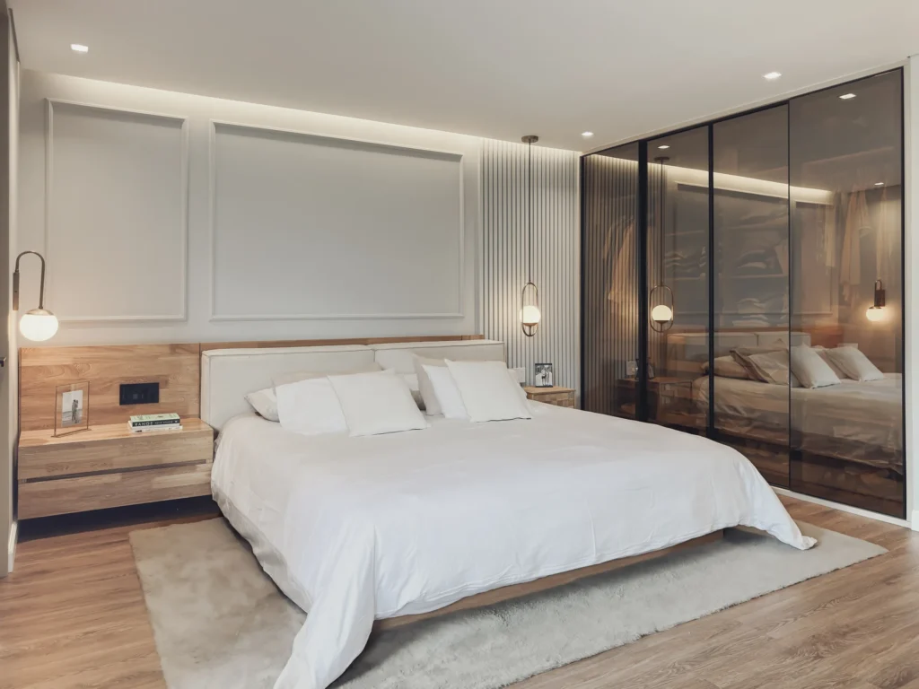 Tierra Grata – master bedroom with moldings and glass walk-in closet