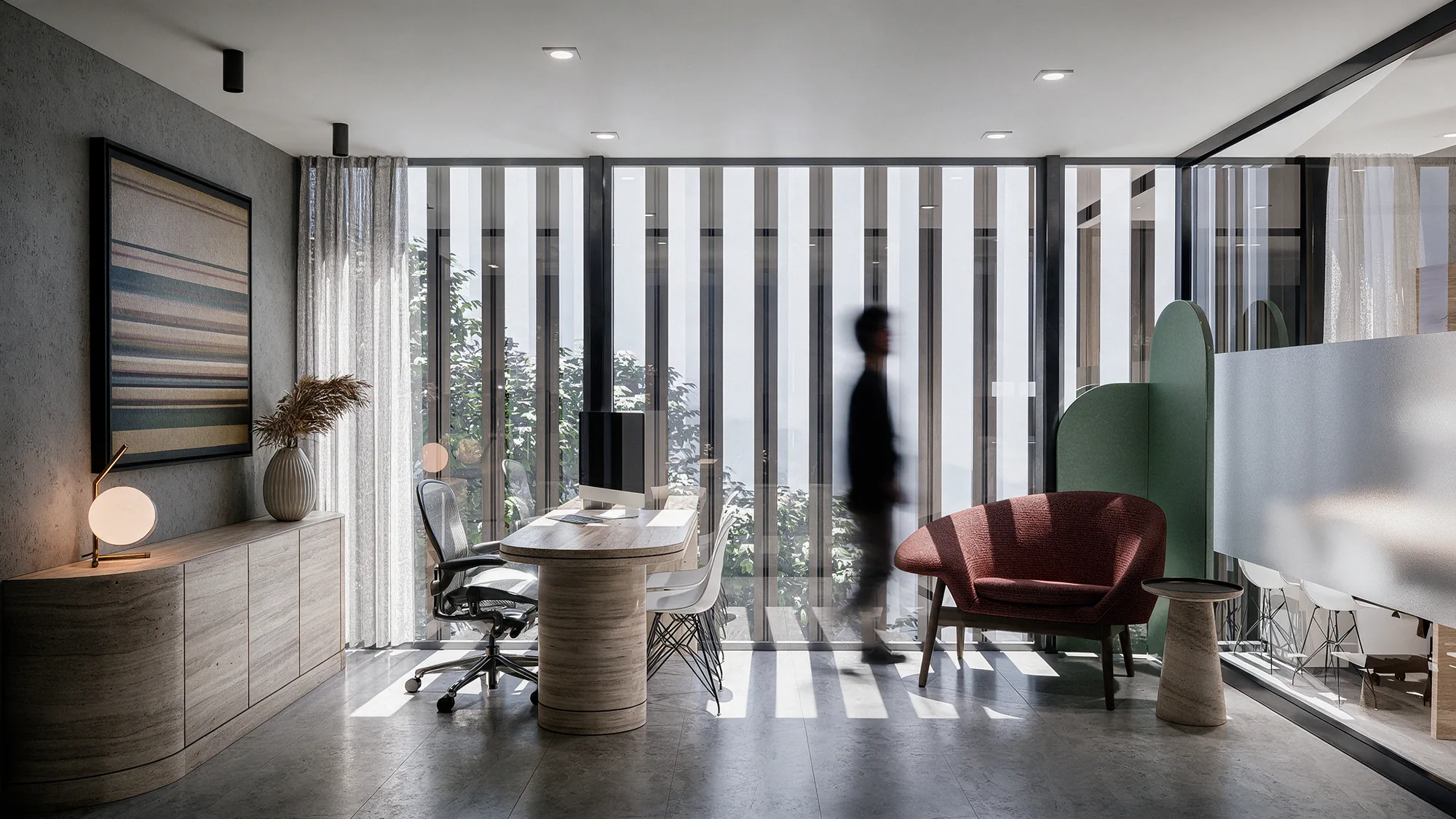Villa & Asociados Offices – office with desk and armchair