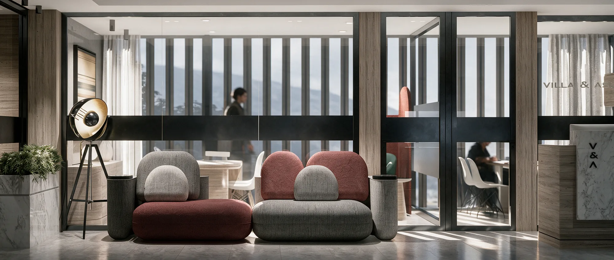 Villa & Asociados Offices – waiting area with colorful armchairs